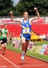 Scott Halsted (Berks) wins the Inter Boys 3000 metres.